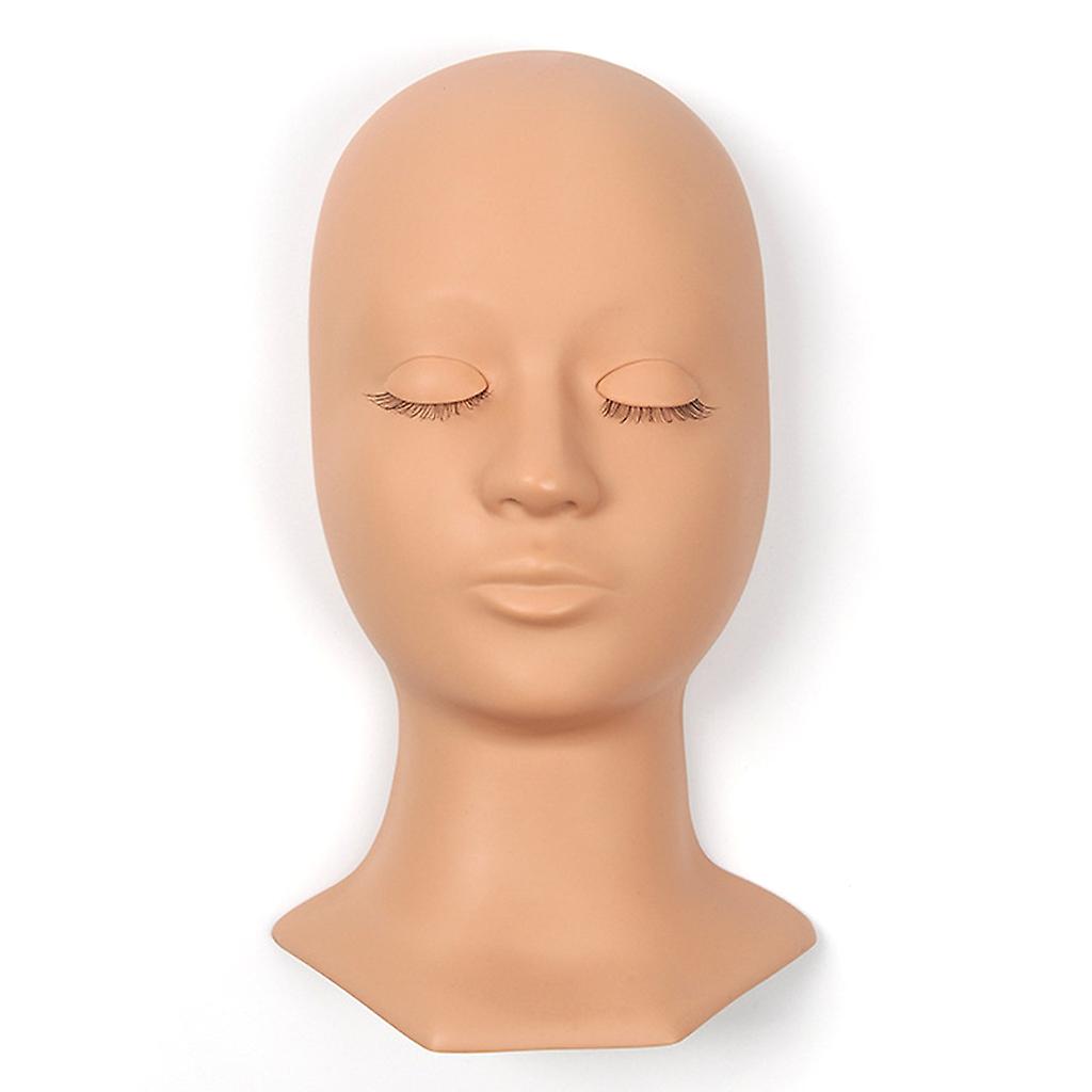 Mannequin training head with removable eyes